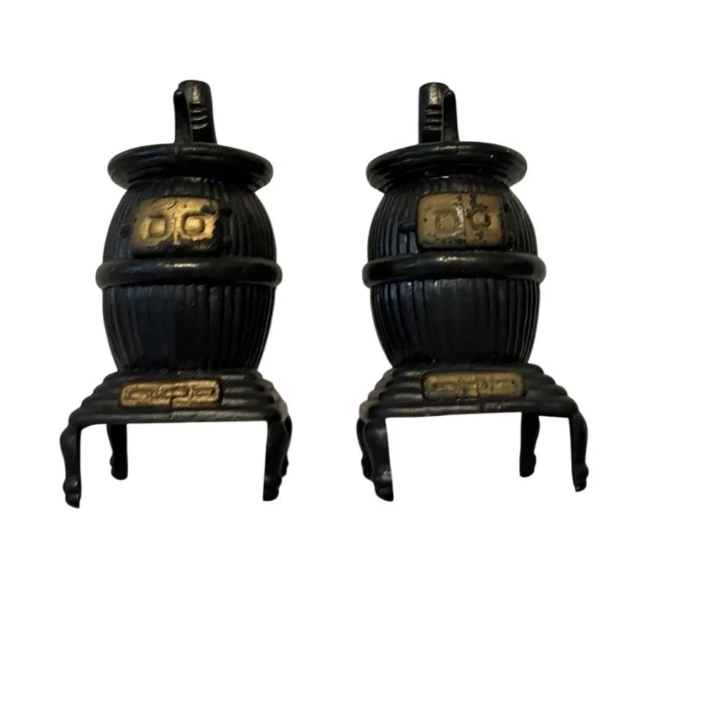 Salt and Pepper Shakers Potbelly Stove Vintage Black Gold Plastic Novelty